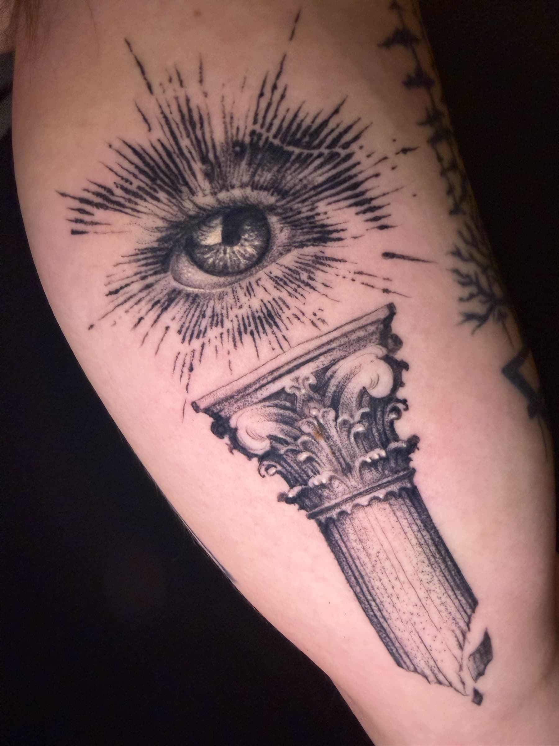 Healed black and grey tattoo by Pete Seyring.